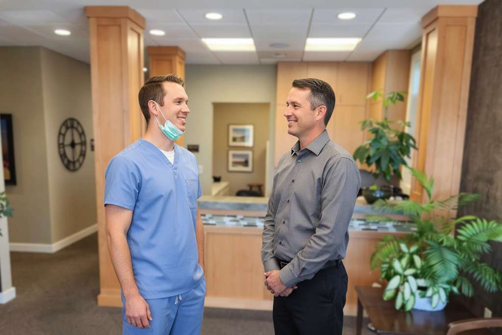 Dentist greeting patient